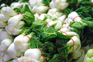 Bunches of green bok choi cabbages at an Asian market