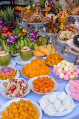 Sacrificial offering food for pray to god and memorial to ancestor, Bangkok, Thailand. Traditional offerings to gods with food, vegetable and fruit for the gods of Thai culture