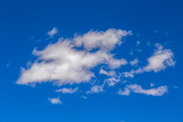 Naklejka na ściany i meble Beautiful white cloud on blue sky background