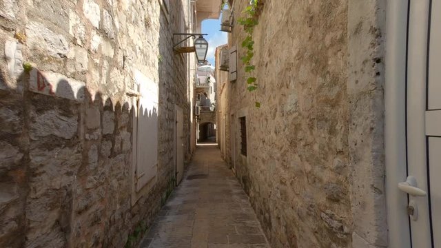 Ancient houses and narrow streets in old town of Budva, Montenegro.