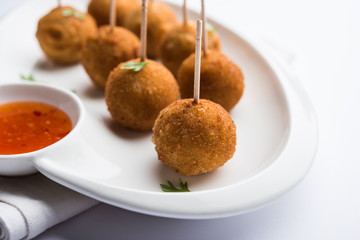 Crispy Veg lollipop recipe made using boiled potato with spices covered with corn flour and bread...