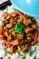 Tajin beef stew with rice paprika and sesame seeds