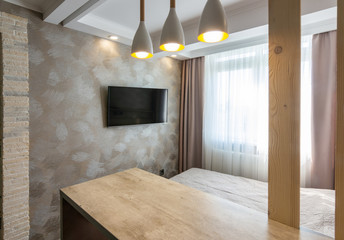 TV in the interior of the bedroom hotel room