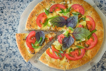 vegetarian pizza with cheese and vegetables