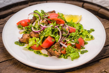 Shish kebab with vegetable salad