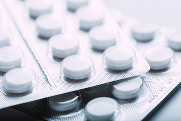 Pills in blister packs isolated on white background