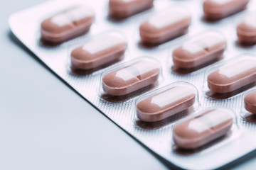 Pills in blister packs isolated on white background