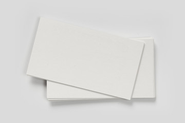 Mockup of business cards stack at white textured background. Design concept. Template for branding identity.