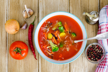 Spicy tomato vegetable soup, top view