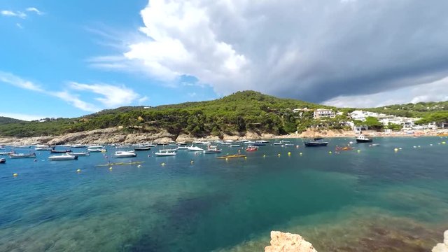 Evening time lapse on one of the coves with yachts. Costa Brava, Spain