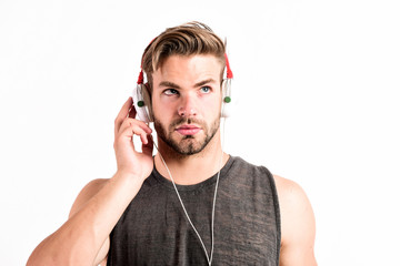 man wearing stereo headphones. relax playlist. sexy muscular man listen music from playlist. man...
