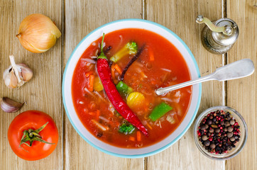Spicy tomato vegetable soup, top view