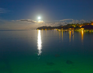 Fototapeta na wymiar Island in ocean at Night.