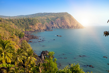 Fototapeta na wymiar Goa. India. Beautiful view from the steep shore to the jungle and the sea