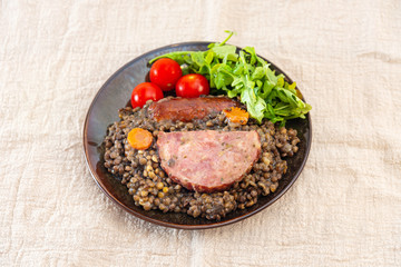 Green lentils with smoked pork sausage smoked choice, carrots and onions
