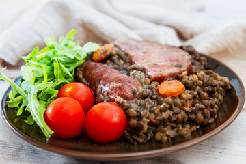 Green lentils with smoked pork sausage smoked choice, carrots and onions