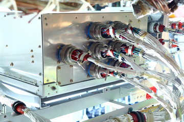 wiring harnesses through the connectors are connected to the unit