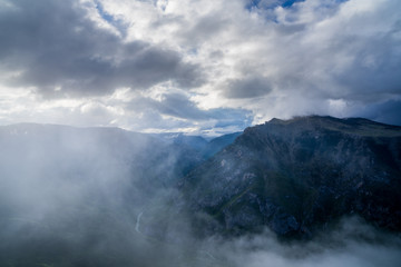 Montenegro, Above spectacular tara river canyon nature landscape of durmitor national park near zabljak from peak of mount curevac in foggy dawning atmosphere