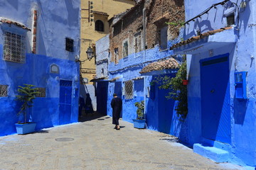 Blue street walls of the popular city of Morocco, Chefchaouen. Traditional moroccan architectural...