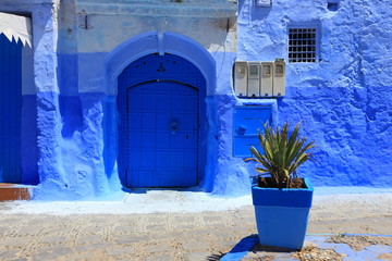 Blue street walls of the popular city of Morocco, Chefchaouen. Traditional moroccan architectural details. - 277672086