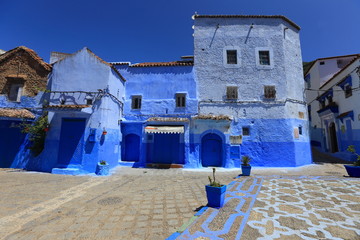 Blue street walls of the popular city of Morocco, Chefchaouen. Traditional moroccan architectural details. - 277672091
