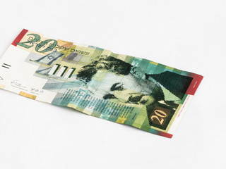 New type of banknote worth 20 Israeli shekels isolated on a white background