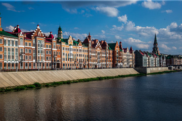 Naklejka premium beautiful houses in the Gothic style are located along the waterfront