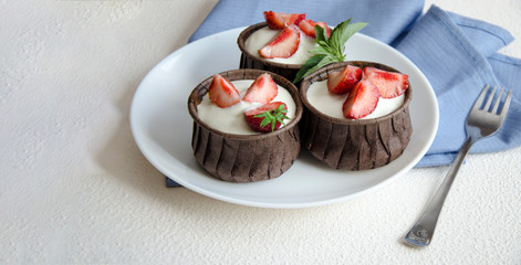 Cheesecakes with strawberries. Menu for kids.