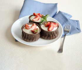 Cheesecakes with strawberries. Menu for kids.