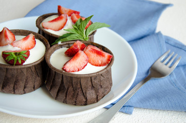 Cheesecakes with strawberries. Menu for kids.