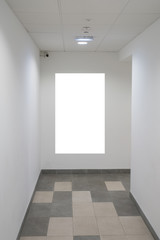 Mock up. Blank billboard, advertising, public information board on the wall in the corridor