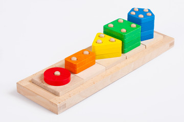 Wooden baby blocks on a white background