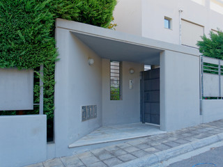 modern house entrance metallic gray door, Athens Greece