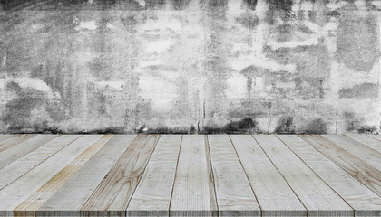 empty room with brick wall and wooden floor