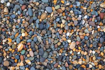 Pebbles on the North beach at Aberystwyth on Cardigan Bay, Wales, UK.
