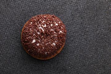 Chocolate Crinkle cookies. close-up of Crinkle cookies chocolate biscuits on Christmas cookies on a black plate, view from above.