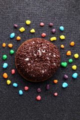 Chocolate Crinkle cookies. close-up of Crinkle cookies chocolate biscuits on Christmas cookies on a black plate, view from above.