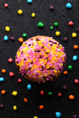 Chocolate Crinkle cookies. close-up of Crinkle cookies chocolate biscuits on Christmas cookies on a black plate, view from above.