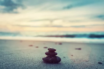 Fotobehang Zen Stenen Stones pyramid on the beach at sunset. Zen  © Photocreo Bednarek