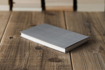 Book on wooden background