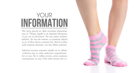 Female legs with pink socks fashion on background isolation