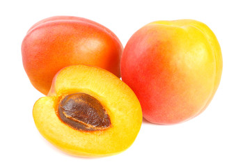 apricot fruits with slices isolated on white background
