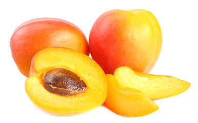 apricot fruits with slices isolated on white background