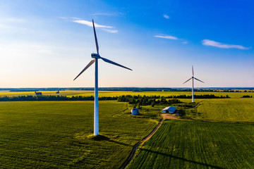 Renewable energy generated in countryside, aerial landscape. Summer time on farm
