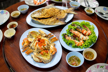 Various of seafood on the wooden table