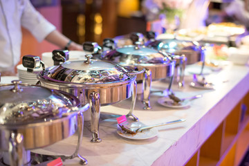 Kitchenware in the line catering buffet food  in luxury restaurant