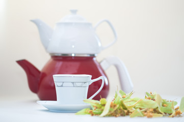 Brew tea with dried linden blossom in natural environment