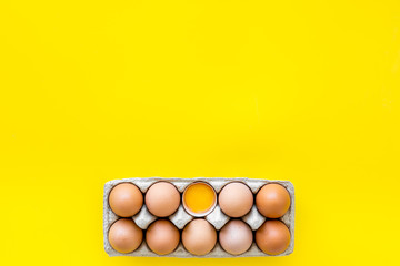 Blog pattern with eggs on yellow background top view copyspace