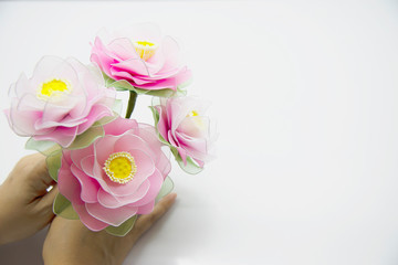 Woman making beautiful nylon flower - people with DIY handmade flower concept