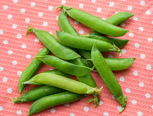 Natural looking fresh green pea. Macro with shallow depth of field.